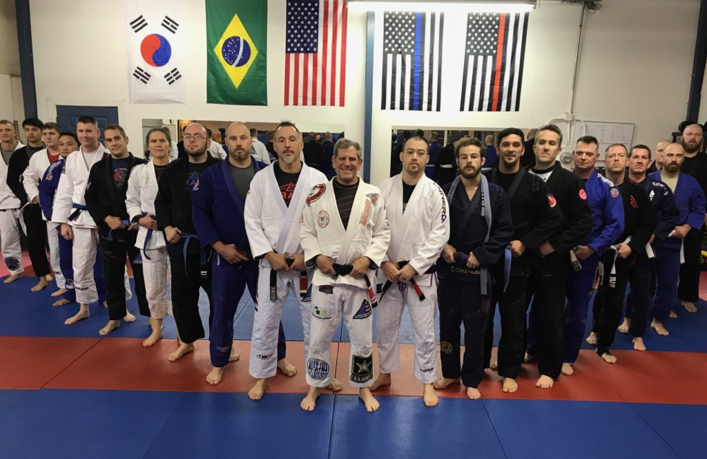 line up of Jiu Jitsu instructors and practitioners