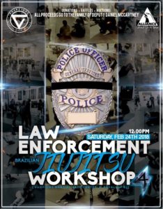 poster with police badge announcing law enforcement jiu jitsu workshop